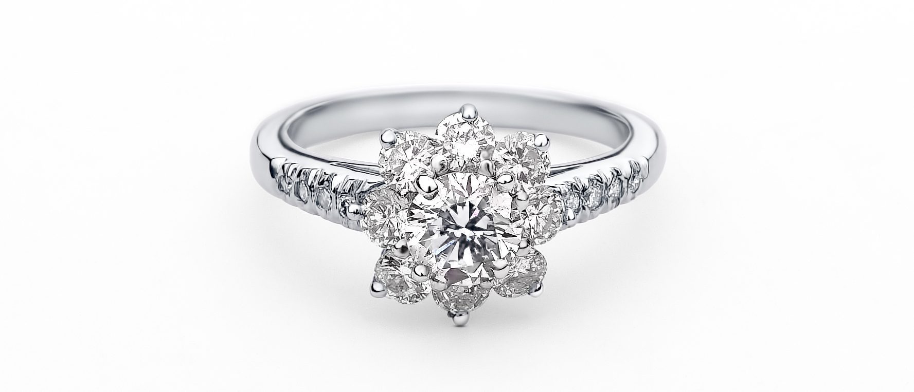 A diamond platinum ring with a flower design.